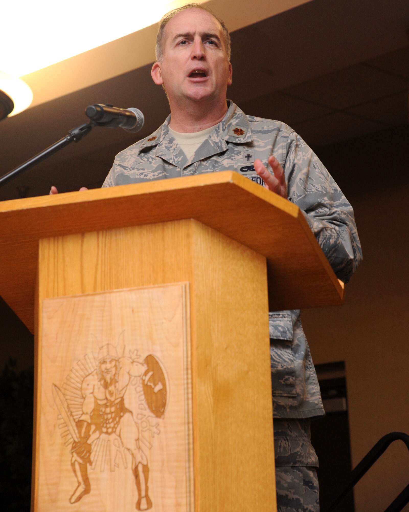 Chaplain Robert Sugg, 319th Air Base Wing, gives an invocation during the National Prayer Luncheon on April 26, 2012, on Grand Forks Air Force Base, N.D.  (U.S. Air Force photo by Airman 1st Class Navarro)