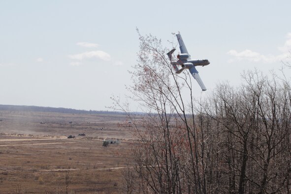 An A-10 Thunderbolt II from the 107th Fighter Squadron turns after dropping ordnance at the  Grayling Aerial Gunnery Range, near Grayling, Mich., April 24, 2012. The Grayling range provides a wide variety of training scenarios for both aircraft and various ground personnel. More than 1,700 air missions are flown every year at the range. (U.S. Air Force photo by TSgt. Dan Heaton)