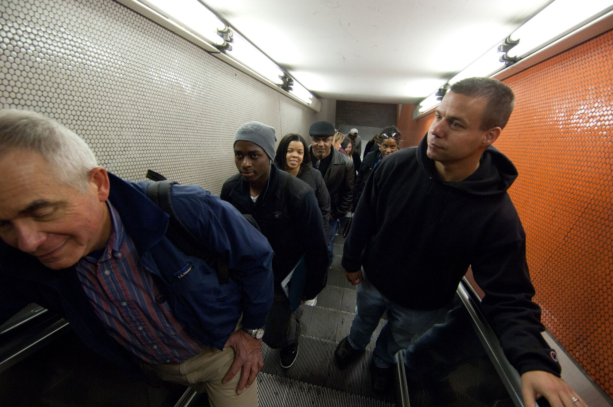 BOSTON, Mass – Hanscom newcomers, led by Airman and Family Readiness Center staff, ride up the escalator after arriving at the State Street station as part of the Newcomers’ Public Transportation and City Orientation April 25. The A&FRC hosts the orientation monthly for new arrivals and their families. (U.S. Air Force photo by Rick Berry)