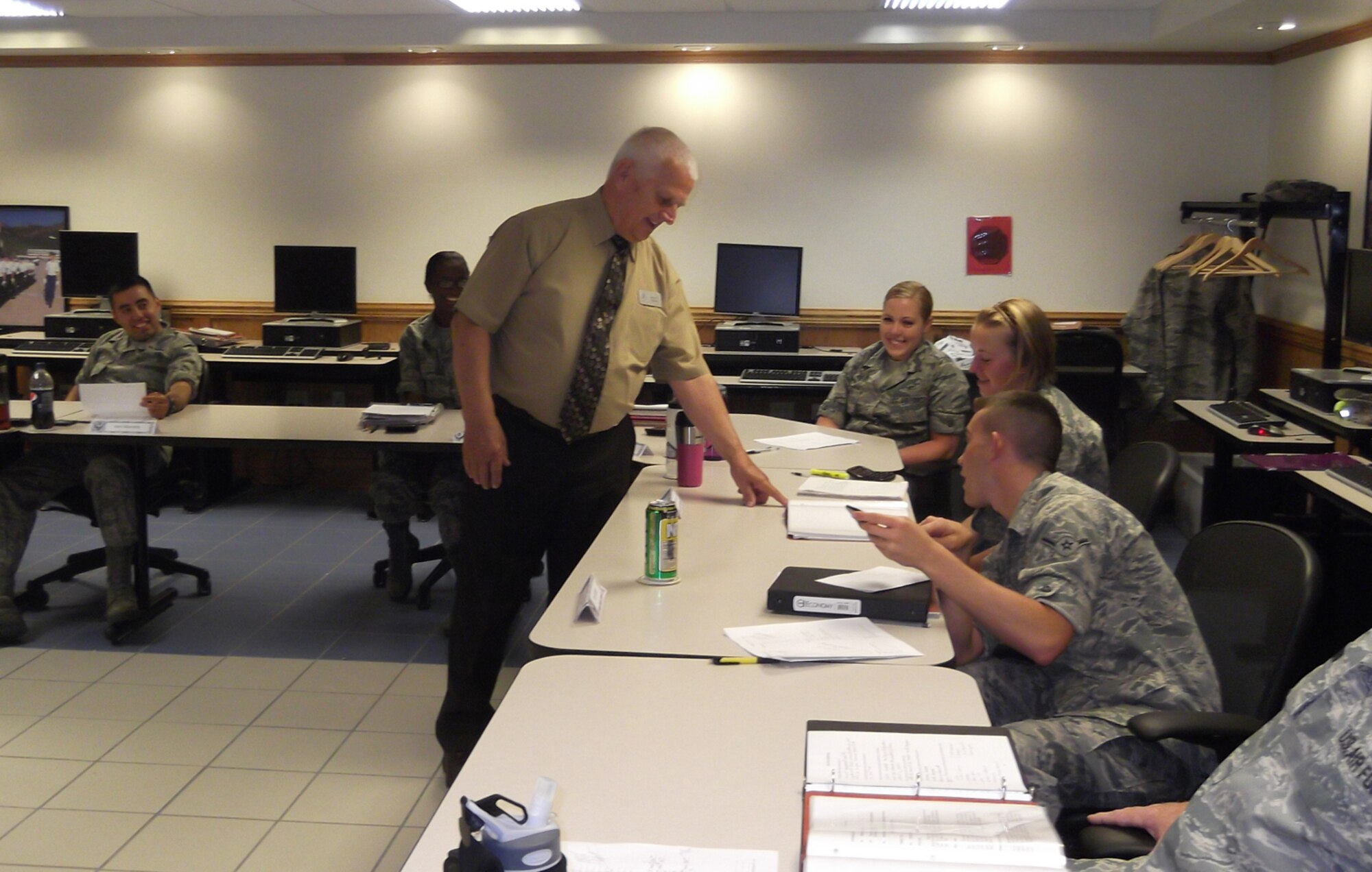 Jerry Haynes, 81st Comptroller Squadron, Keesler Air Force Base, Miss., briefs students of a financial management apprentice class on the locations of their first assignment along with general information on the assignment swap program and obtaining a sponsor.  Haynes retired April 30, 2012, with 21 years of active duty and 26 years of civil service. (Courtesy photo)