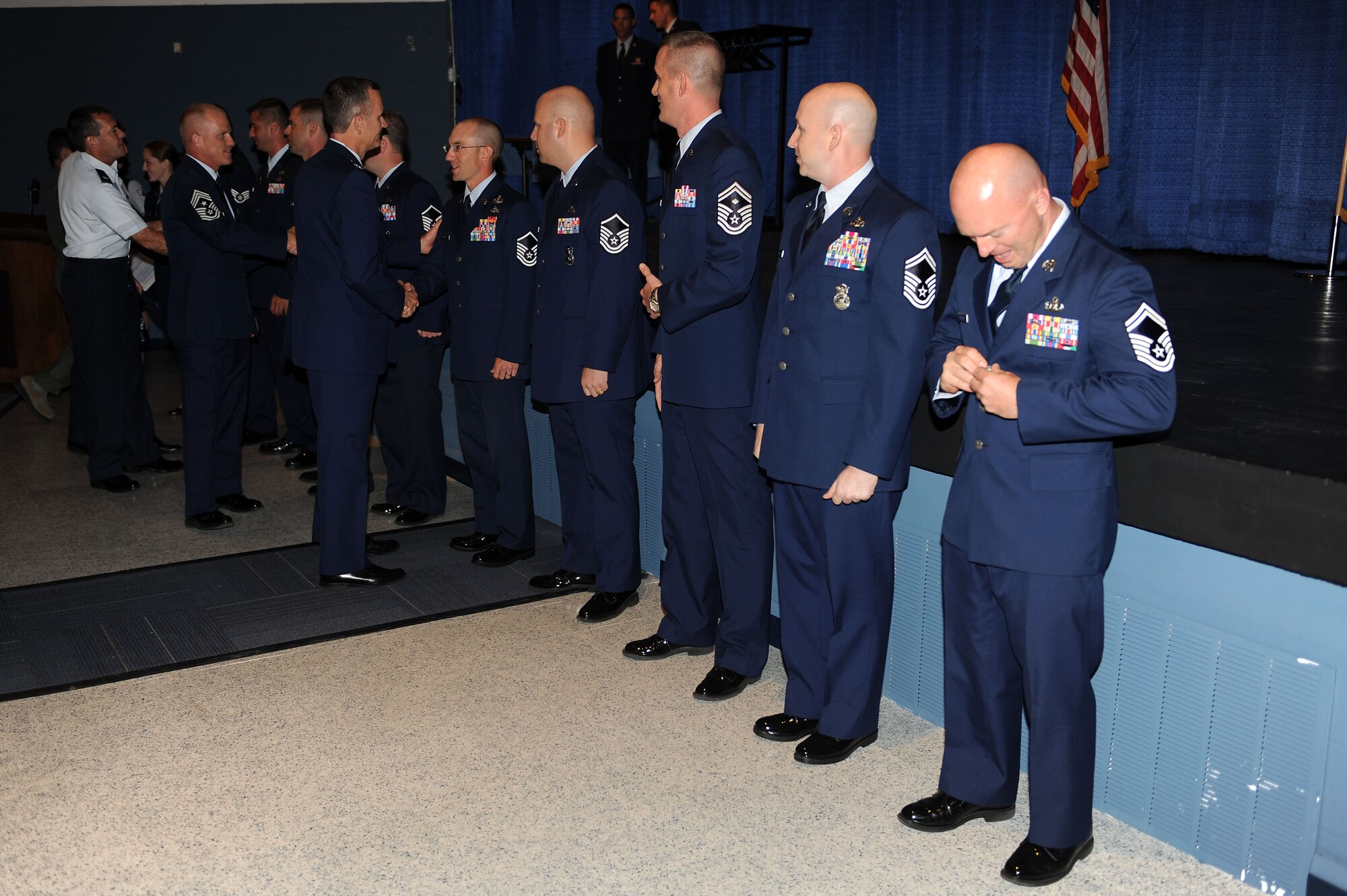 Promotees are congratulated at a non-commissioned officer promotion ceremony at Moody Air Force Base, Ga., April 30, 2012. Supervisors, coworkers, family and friends were in attendance to honor their recent accomplishments. (U.S. Air Force photo by Staff Sgt. Ciara Wymbs/Released) 