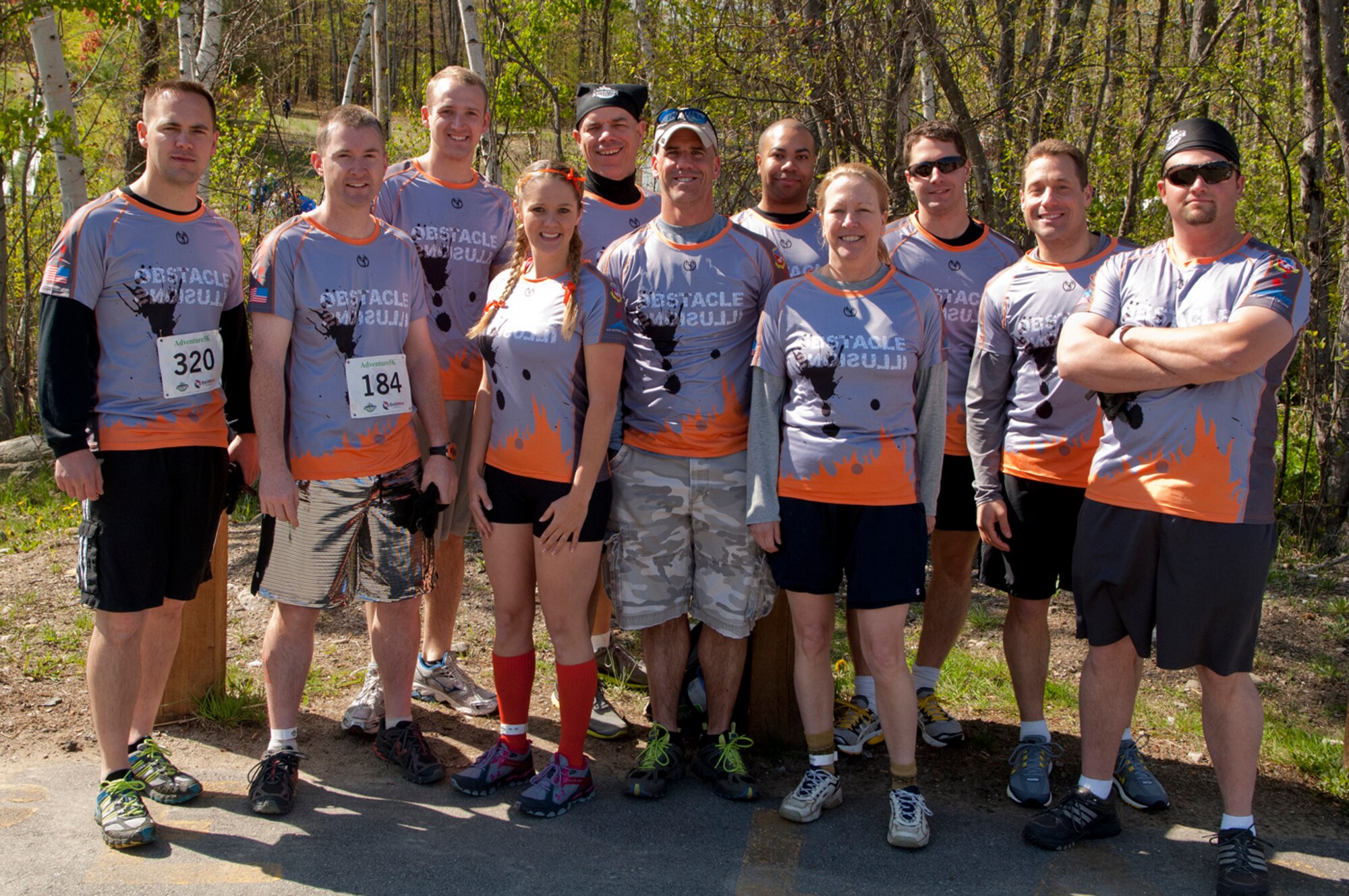 MANCHESTER, N.H. -- Obstacle Illusion, a team comprised of members of the New Hampshire Air National Guard pose before competing in the Adventure 5k at McIntyre Ski Area April 28. More than 800 participants ran through mud trails and over obstacles during the 3.1 mile event. (National Guard photo by Tech. Sgt. Mark Wyatt/Released)
