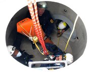 Firefighters with Schriever and Colorado Springs Fire Departments lift a “victim” during confined-space training May 1 at Schriever Air Force Base. The training is just one of the many events that Schriever and Colorado Springs Fire Departments have planned to perform. (U.S. Air Force photo/Staff Sgt. Julius Delos Reyes)