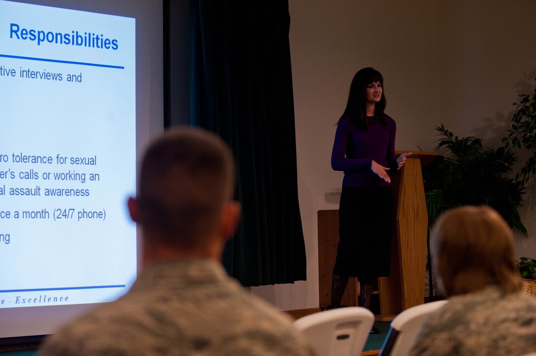 Kelly Dominquez, sexual assault response coordinator, gives a victim’s advocate briefing for Airmen at Ellsworth Air Force Base, S.D., April 27, 2012. The victim’s advocate program teaches Airmen to provide crisis intervention, referral, and ongoing support to victims of sexual assault. Male and female Airmen interested in the victim advocate program can call (605) 385-5233. (U.S. Air Force photo by Airman 1st Class Zachary Hada/Released)