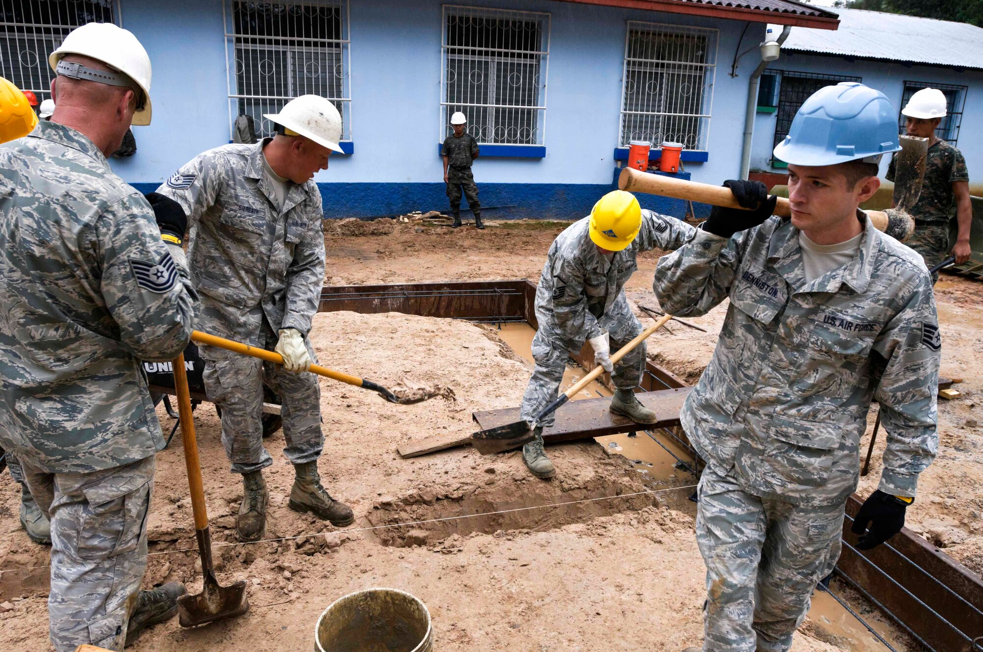 Staff Sgt. Joshua Denniston steps out after digging a trench that will eventually become the foundation of a women’s clinic in the Guatemalan town of Tactic. Denniston, an Airman with the Arkansas Air National Guard’s 188th Civil Engineering Squadron, is deployed to Guatemala in support of Beyond the Horizon 2012 and will spend two weeks working in Tactic to nearly double the available space of the Centro de Salud clinic. The 188th CES, which is part of the 188th Fighter Wing, sent three teams in three separate two-week rotations to Guatemala. (U.S. Army photo by Spc. Anthony D. Jones)