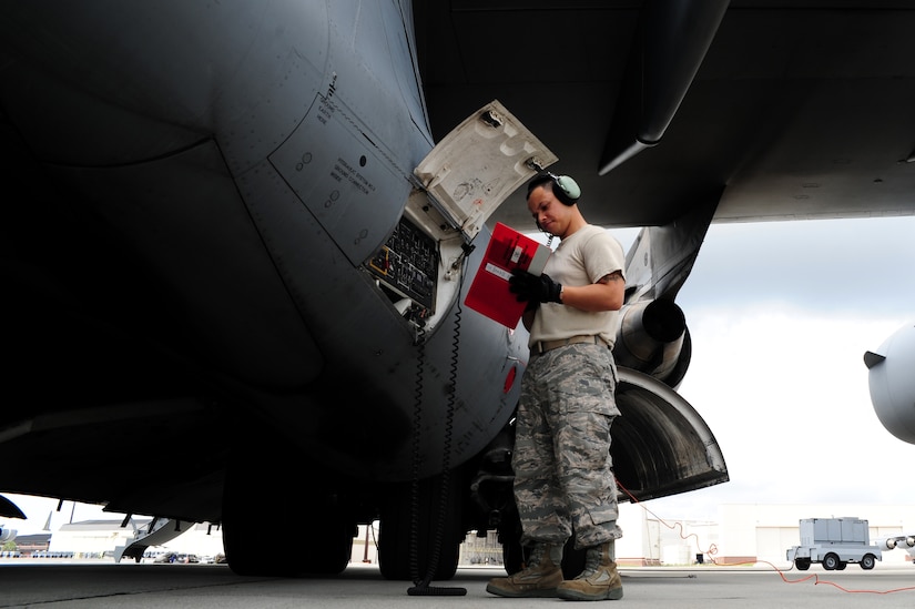 Senior Airman Rafael Lopez-Martinez reviews the refueling checklist prior to refueling a C-17 Globemaster III, at Joint Base Charleston - Air base, April 18. The C-17 can hold up to 35,546 gallons of fuel and can carry a maximum of 17,900 pounds and land on runways as short as 3,500 feet which is crucial to resupplying remote areas from the air or ground. Lopez-Martinez is from the 437th Aircraft Maintenance Squadron Gold AMU.  (U.S. Air Force photo/ Staff Sgt. Nicole Mickle)  


