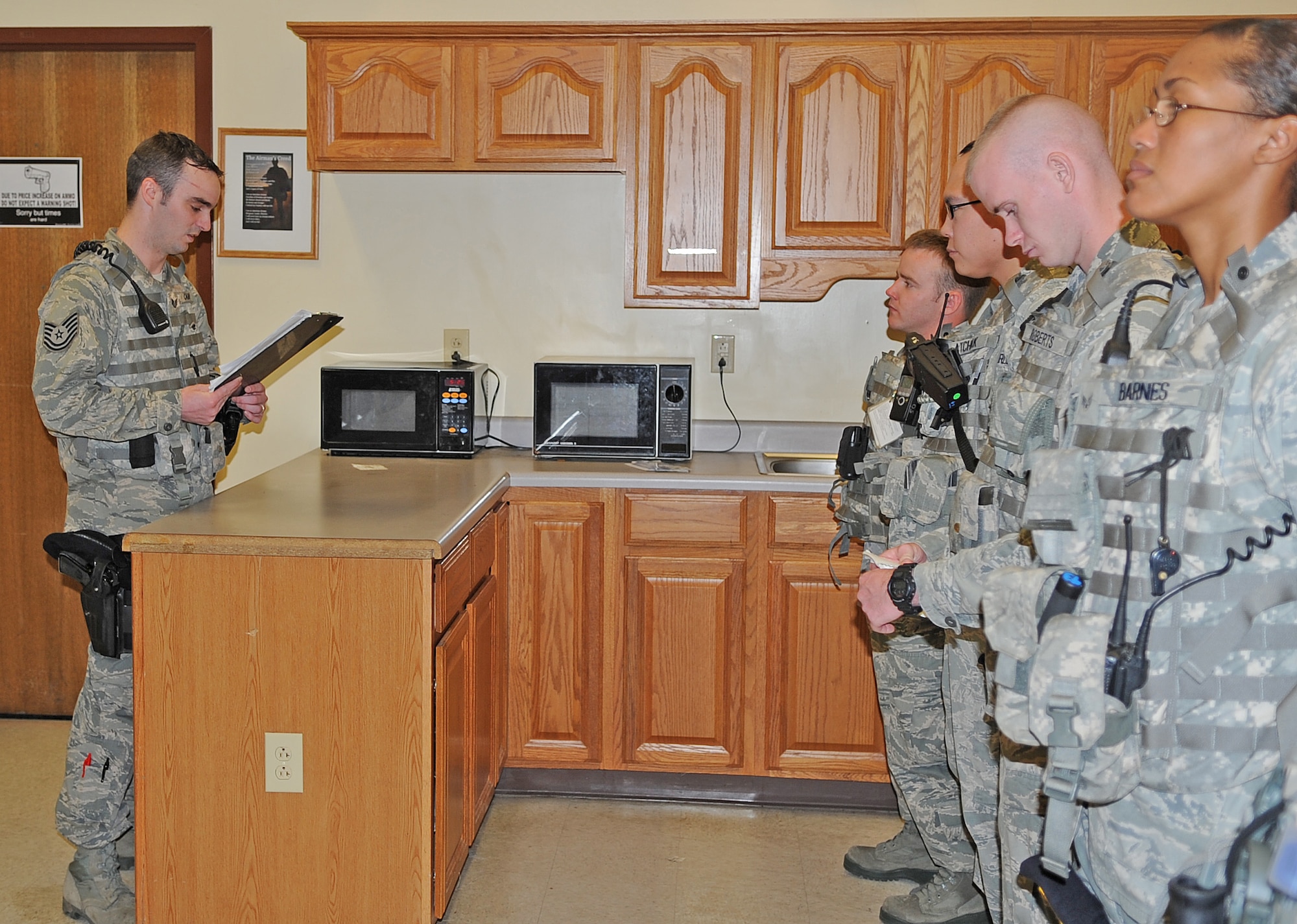 U.S. Air Force Tech. Sgt. Bradford Camp briefs his flight on field procedures at Seymour Johnson Air Force Base, N.C., April 26, 2012. Camp recently earned the Colonel Billy Jack Carter Award for serving courageously in a combat zone, meritoriously at home station and going above and beyond the call of duty no matter what he was tasked to do. Camp, 4th Security Forces Squadron flight chief, hails from Wilmington, N.C. (U.S Air Force photo/Senior Airman Gino Reyes/Released)