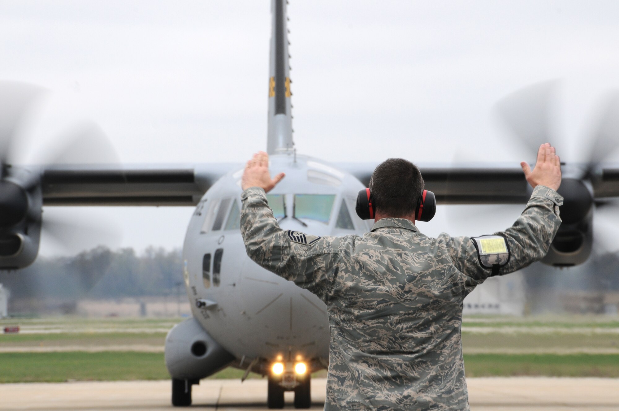 Master Sgt. David Moessinger, crew chief for the 110th Airlift Wing launches two C-27J Aircraft carrying Army soldiers from the 351st Aviation Support Battalion, on Saturday, March 31, 2012 at Battle Creek Air National Guard Base, Battle Creek, Mich. (U.S. Air National Guard photo by Master Sgt. Sonia Pawloski/released)