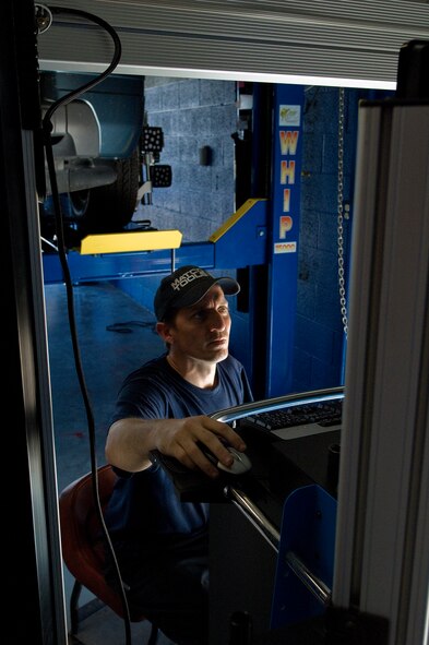 Bill Miley, Dyess Auto Hobby Shop technician, checks tire alignment with a Geoliner 680 May 1, 2012, at Dyess Air Force Base, Texas. The new $40,000 state-of-the-art machine allows auto shop technicians to complete tire alignments with pinpoint accuracy. Correct wheel alignments reduce tire wear, improves fuel efficiency, enhances the comfort of the ride and helps with safe steering. (U.S. Air Force photo by Airman 1st Class Damon Kasberg /Released)