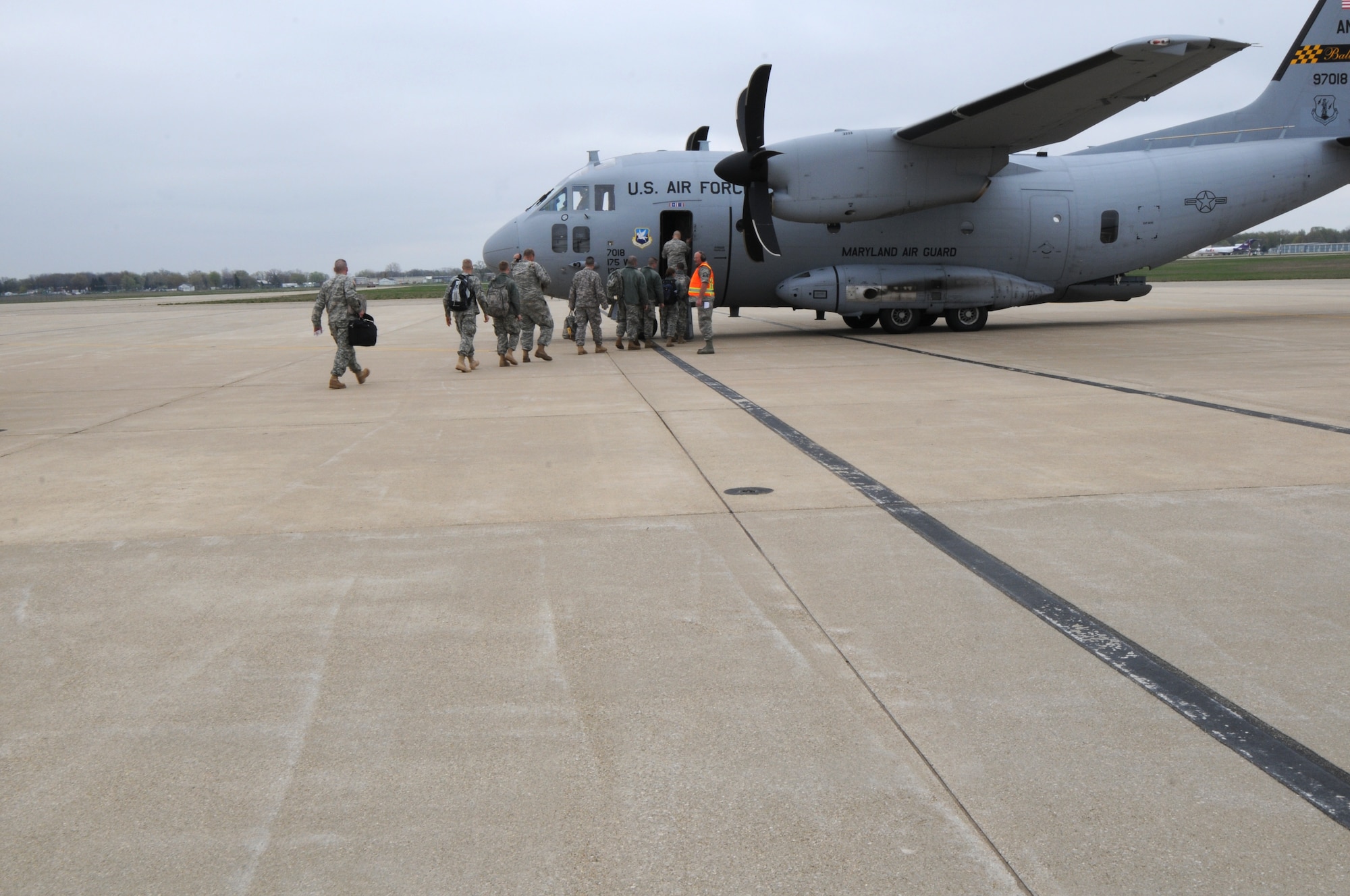 Army soldiers from the 351st Aviation Support Battalion climb aboard a C-27J Aircraft on Saturday, March 31, 2012 at Battle Creek Air National Guard Base, Battle Creek, Mich. The 110th Airlift Wing Aerial Port facilitates the processing and departure of many Army soldiers at Battle Creek Air National Guard Base, Battle Creek, Mich. (U.S. Air National Guard photo by Master Sgt. Sonia Pawloksi /released)