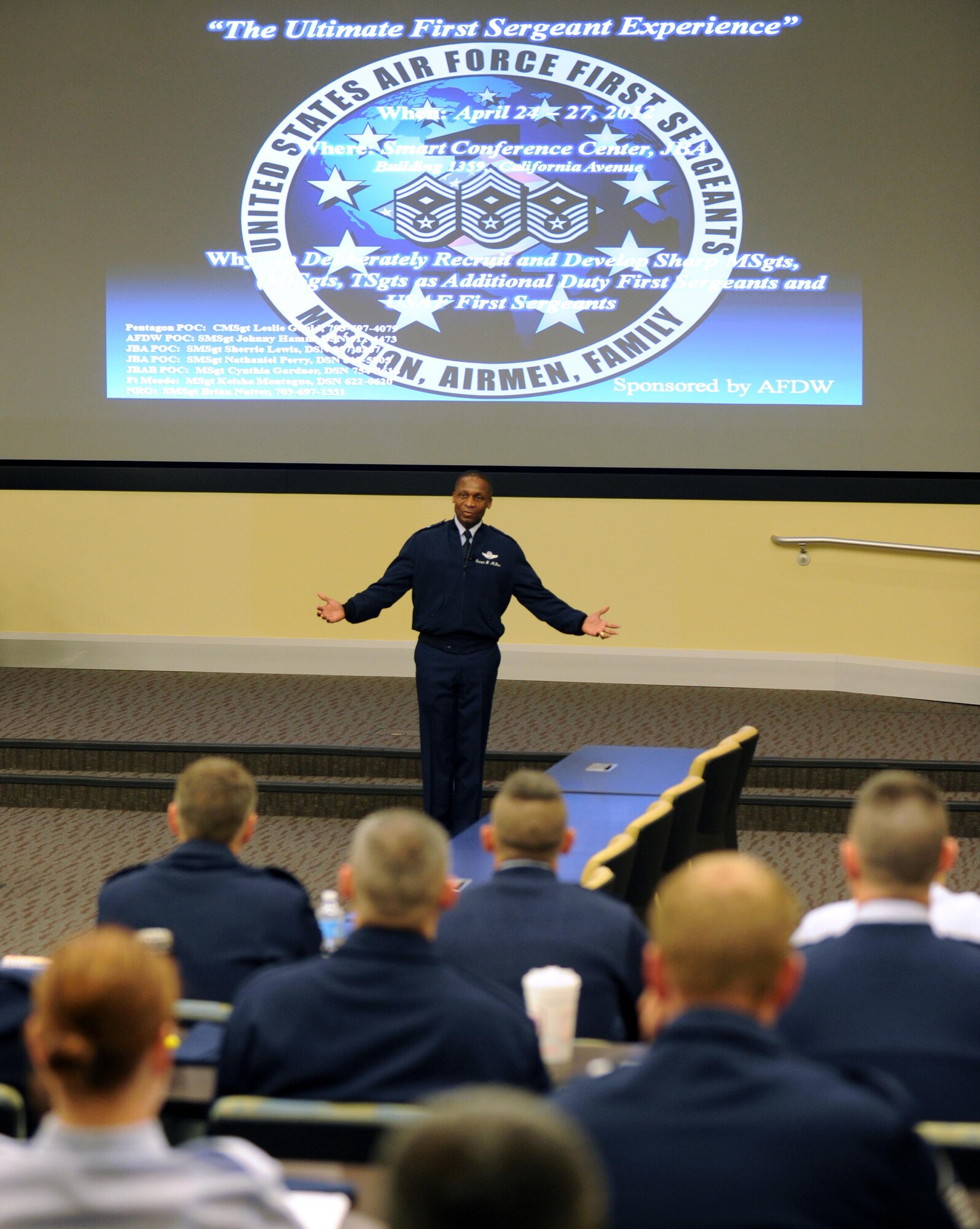 Air Force District of Washington Commander Maj. Gen. Darren W. McDew speaks
to a crowd of 118 technical and master sergeants from around the National
Capital Region during The Ultimate First Sergeant Experience, four days of
in-depth training held April 24-27 for prospective first sergeants. "Don't
be nostalgic about how the Air Force was," said McDew, during opening
comments in which he encouraged the prospective first sergeants to learn all
they could during the seminar and consider applying for the special duty
assignment. "Embrace what it needs to be, and step up and help us meet the
needs of today's Air Force."