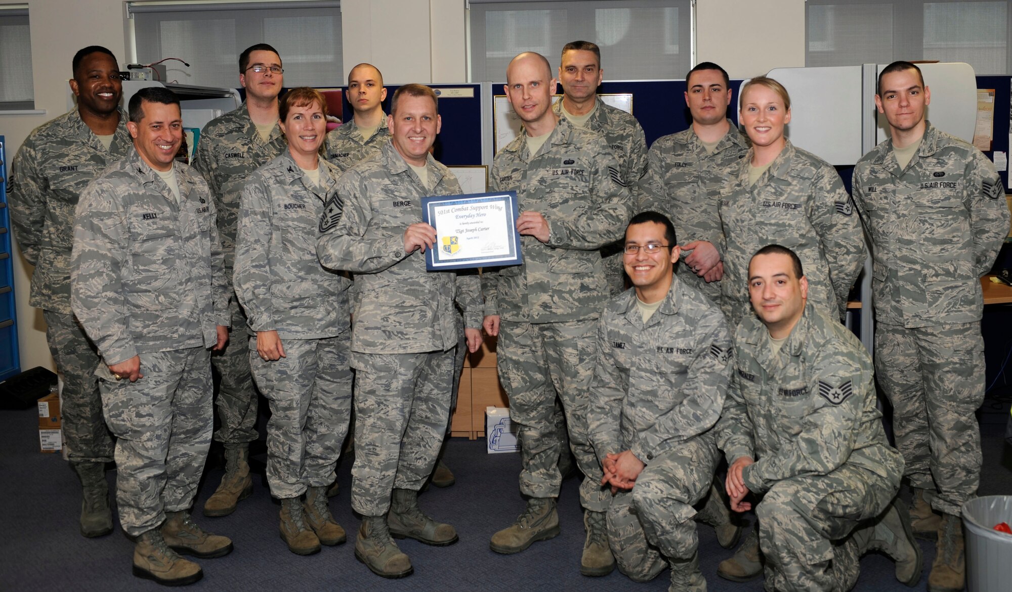 RAF MENWITH HILL, United Kingdom - Tech. Sgt. Joseph Carter, 421st Air Base Squadron, was named the April 501st Everyday Hero from the 421st Air Base Group. Carter is the chief of plans and programs for the squadron's communications flight. He recently worked with a local telephone company to revise communications infrastructure drawings, which are critical for current and future base communications planning.  (U.S. Air Force photo by Staff Sgt. Brok McCarthy)