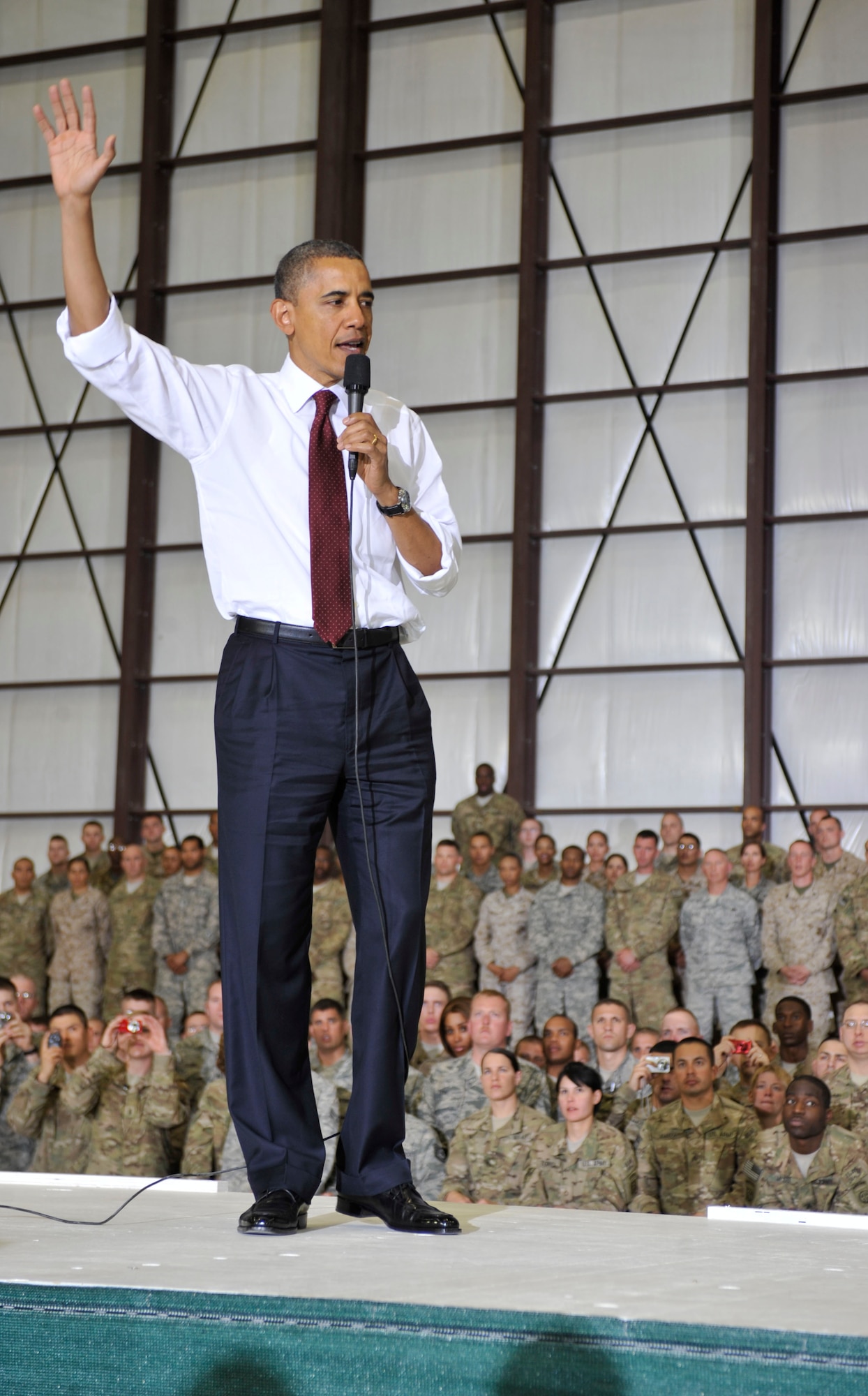 United States President Barack Obama visited Bagram Airfield, Afghanistan to greet Soldiers, Sailors, Airmen and Marines on the anniversary of the death of Al Qaeda leader, Osama Bin Laden.  President Obama told the crowd that he is proud of them and that many of the positive events in Afghanistan occurred in part because of all the U.S. armed services have done.  The event was held in the 455th Air Refueling Wing’s C-130 hangar on May 2, 2012.  (U.S. Air Force photo/Airman 1st Class Ericka Engblom)