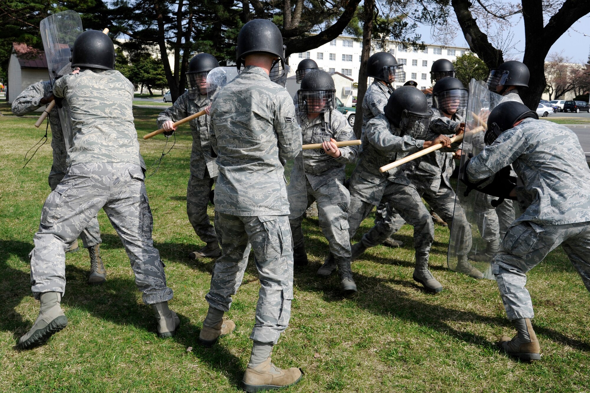 U.S. Airmen with the 35th Security Forces Squadron conducts crowd control training at Misawa Air Base, Japan, April 28, 2012. The training is used to diffuse situations where lives and resources are endangered. (U.S. Air Force photo by Tech. Sgt. Marie Brown/Released)
