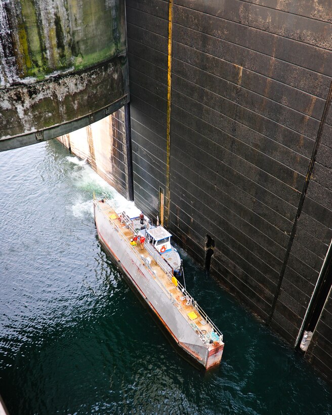 Progress continues as John Day gate sections are moved into place following the dewatering, which began Dec. 10, 2010.