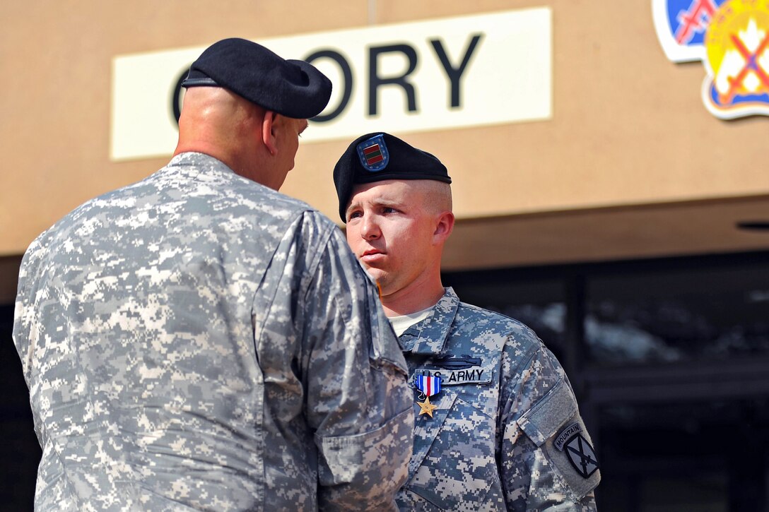 Army Chief of Staff Gen. Raymond T. Odierno presents the Slver Star Medal to Sgt. M. Joshua Laughery during a ceremony on Fort Polk, La., May 1, 2012. Laughery received the medal for his actions during a battle in Afghanistan’s Wardak province on Sept. 12, 2011.