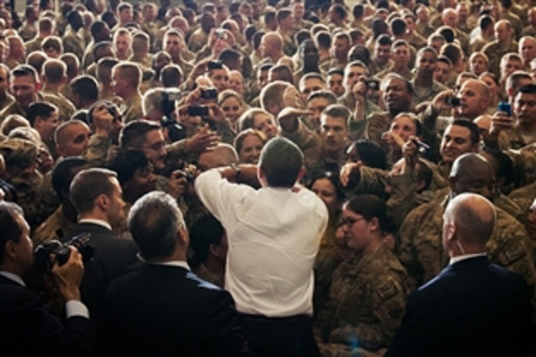 U.S. President Barack Obama interacts with troops on Bagram Airfield, Afghanistan, May 2, 2012. Obama made a surprise visit to the air base, where he announced that he signed a strategic partnership agreement with Afghan President Hamid Karzai detailing the relationship between the United States and Afghanistan as the war there nears an end. 