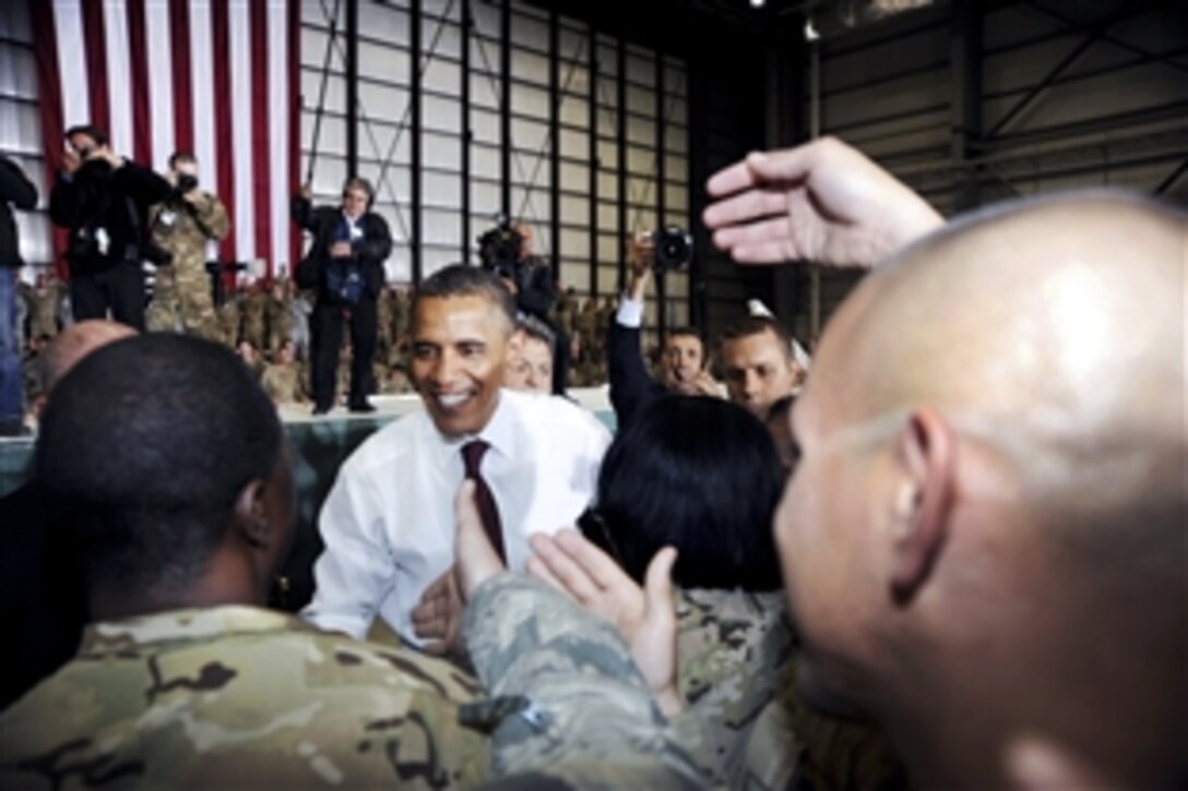 U.S. President Barack Obama shakes hands and greets troops on Bagram Airfield in Afghanistan's Parwan province, May 2, 2012. 
