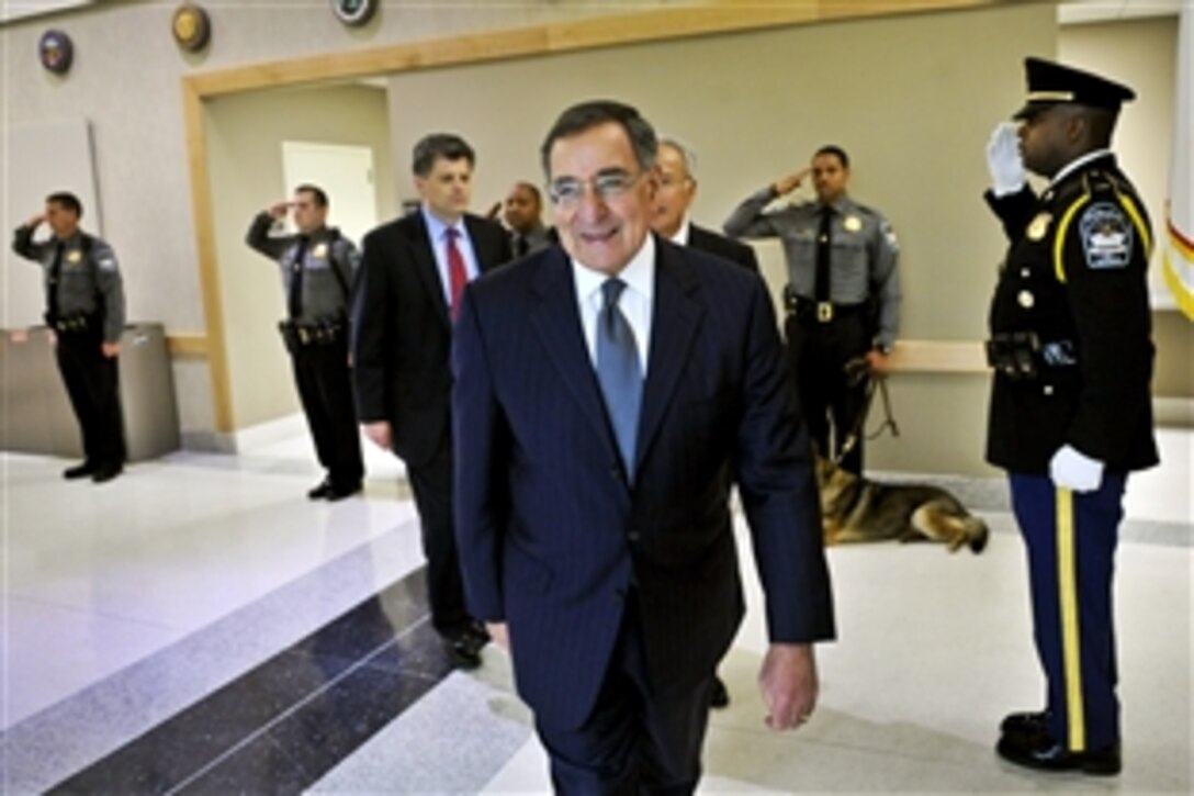 Defense Secretary Leon E. Panetta walks through an honor cordon before going to the Pentagon Force Protection Agency's 10th anniversary event at the Pentagon, May 2, 2012. The agency was established on May 3, 2002, in response to the Sept. 11, 2001, terror attacks and the October 2001 anthrax attacks.