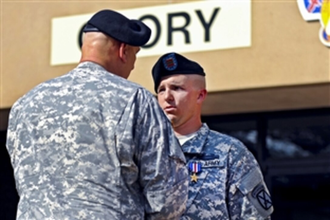 Army Chief of Staff Gen. Raymond T. Odierno presents the Slver Star Medal to Sgt. M. Joshua Laughery during a ceremony on Fort Polk, La., May 1, 2012. Laughery received the medal for his actions during a battle in Afghanistan’s Wardak province on Sept. 12, 2011.