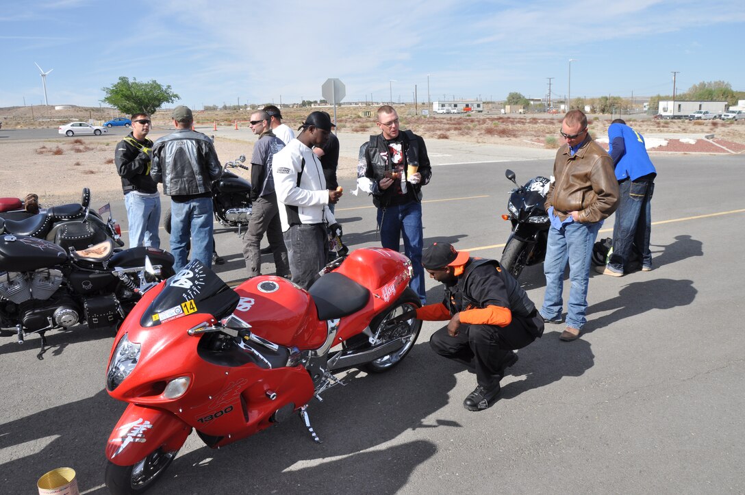 Bike enthusiasts gather and talk during the inaugural Motorcycle Rodeo and Safety Event held aboard Marine Corps Logistics Base Barstow May 2 aboard the installation. During the event, riders were able to gain bragging rights by participating in several competitions to put their riding skills to the test against one another.