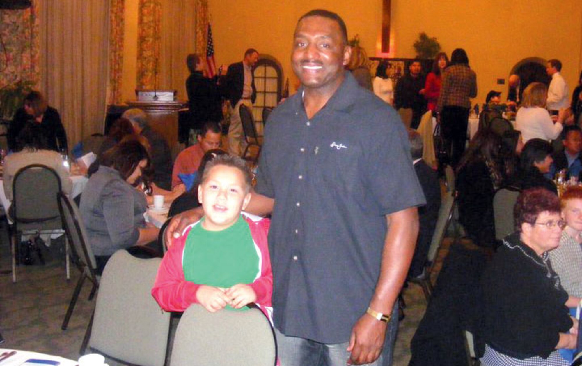 Master Sgt. Sherman Harris poses with Daniel Machado at an
annual Big Brother’s Banquet. (Courtesy photo to U.S. Air Force)