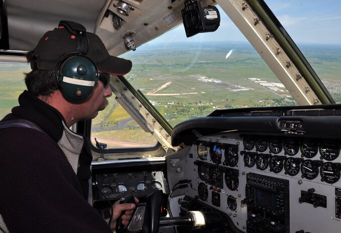 Pilot Shean Merwin flies his aircraft towards the Lincoln Regional Airport Calif., during Beale’s Jump Into Prevention skydiving event April 27, 2012. Merwin took members of Team Beale to an approximate altitude of 13,000 feet before they jumped to raise sexual assault awareness.