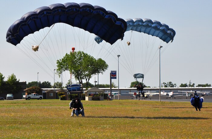 Members of Team Beale land at their drop zone during Beale’s Jump Into Prevention skydiving event at Lincoln Regional Airport, Calif., April 27, 2012. The event was put on by Beale’s Sexual Assault Prevention and Response Program to raise awareness about sexual assault.