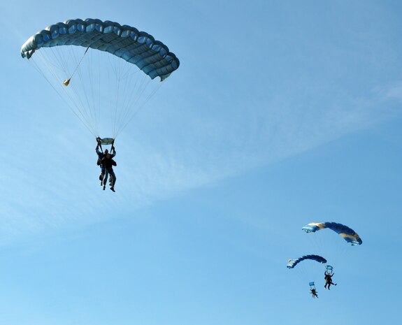 Members of Team Beale descend towards their landing zone during the Jump Into Prevention skydiving event at Lincoln Regional Airport, Calif., April 27, 2012. The Airmen made the tandem skydive with a local skydiving instructor to promote sexual assault awareness.
