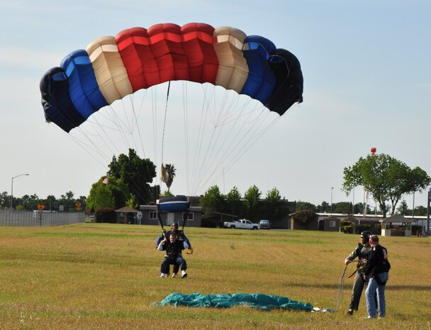 Col. Phil Stewart, 9th Reconnaissance Wing vice commander lands, at a drop zone during Team Beale’s Jump Into Prevention skydiving event at  Lincoln Regional Airport, Calif., April 27, 2012. Stewart and more than 70 Airmen skydived to promote sexual assault awareness.