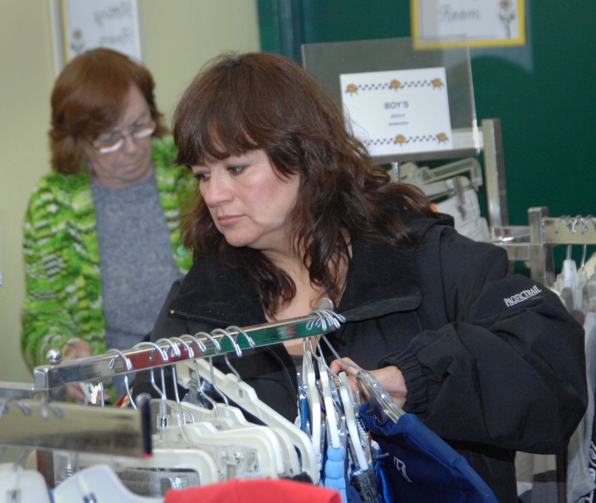 Customers peruse through items at the thrift shop May 3, 2012, at Mountain Home Air Force Base, Idaho. The thrift store’s profits go back into the base and local community through scholarships for dependents, local community charities, and even donations to Airmen Against Drunk Driving and the base chapel. (U.S. Air Force photo/Senior Airman Benjamin Sutton)