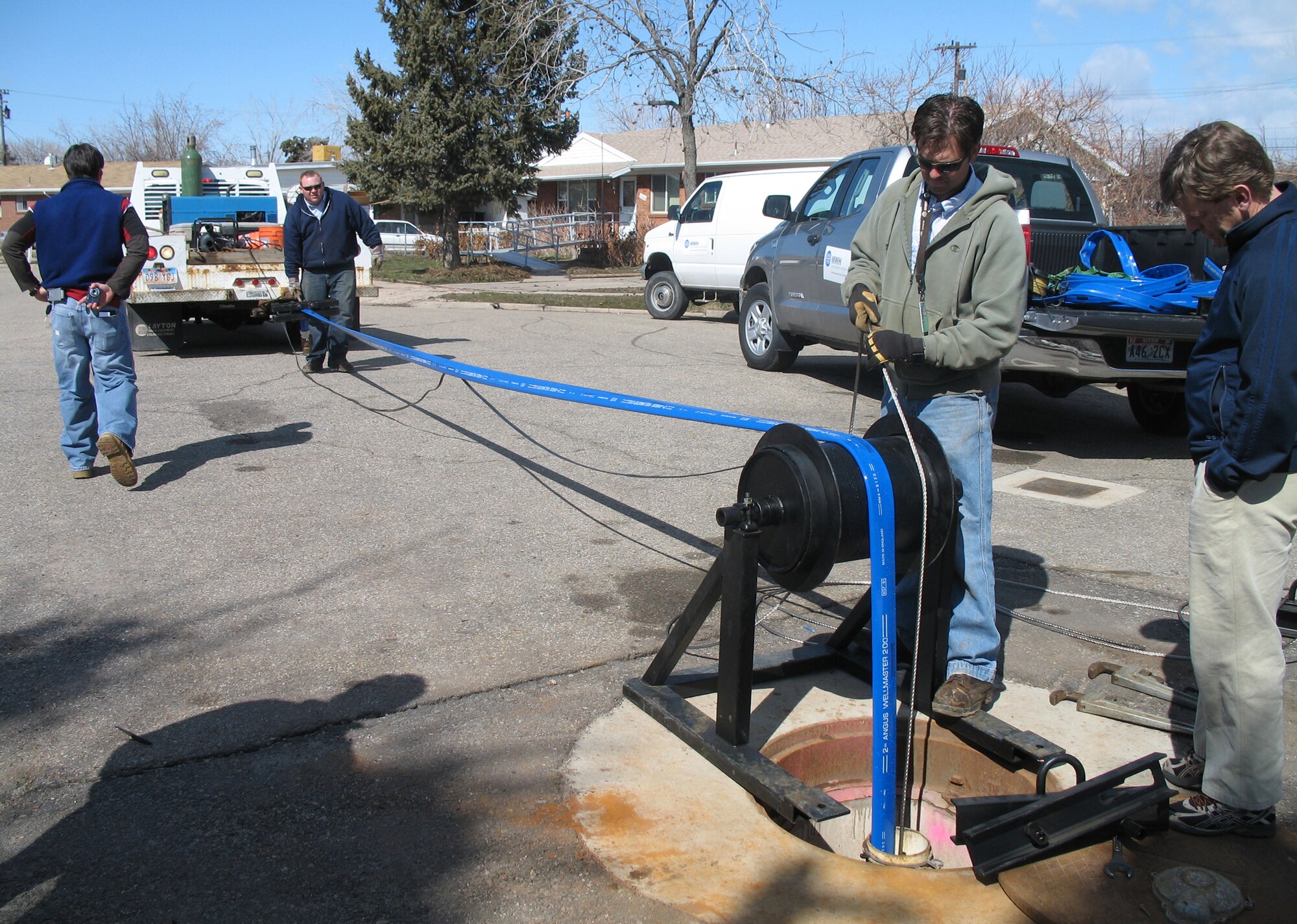 The 75th Civil Engineer Group restoration team conducts fieldwork and sampling in a community neighboring Hill Air Force Base, Utah, recently. Hill AFB was recently awarded top Department of Defense honors for their work in environmental restoration, which includes public involvement and notification in the cleanup process. (Courtesy photo)