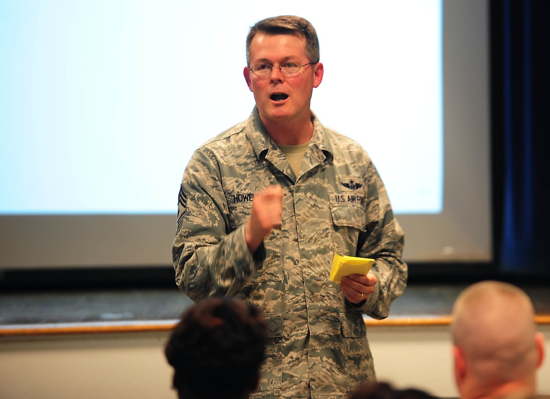 U.S. Air Force Chief Master Sgt. Kevin Howell, 633rd Air Base Wing command chief, addresses participants of the 2012 Caring for People Forum at Langley Air Force Base, Va., May 2, 2012.  The topics discussed during the forum were special needs family member advocate, U.S. Air National Guard and U.S. Air Force Reserve support, family and teen programs, health and wellness sponsorship, deployment support and single Airmen with unaccompanied housing assistance.  (U.S. Air Force photo by Airman 1st Class Kayla Newman/Released)