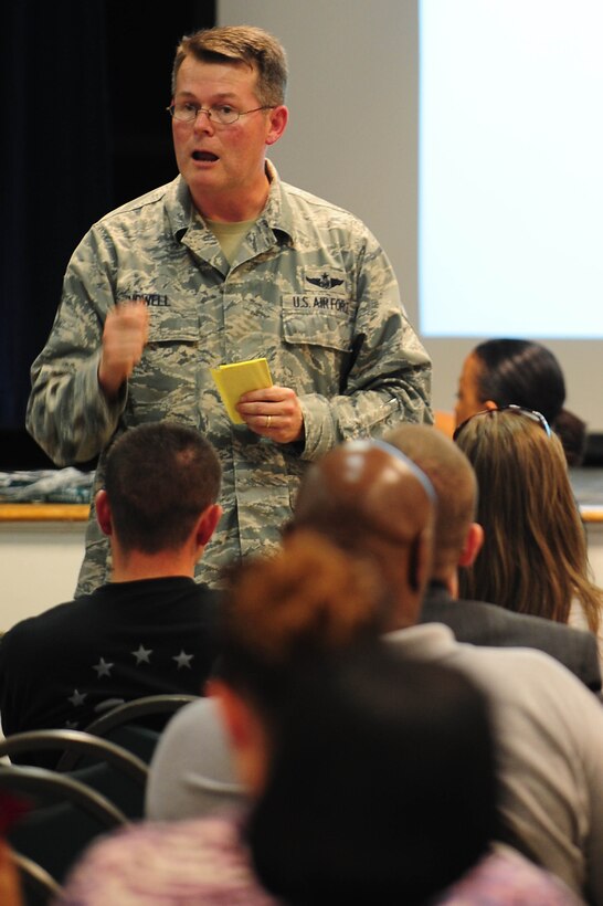 U.S. Air Force Chief Master Sgt. Kevin Howell, 633rd Air Base Wing command chief, speaks to the volunteers participating in the 2012 Caring for People Forum at Langley Air Force Base, Va., May 2, 2012.  The forum has become one of the preferred methods for senior Air Force leadership to understand and act on community concerns.  (U.S. Air Force photo by Airman 1st Class Kayla Newman/Released)