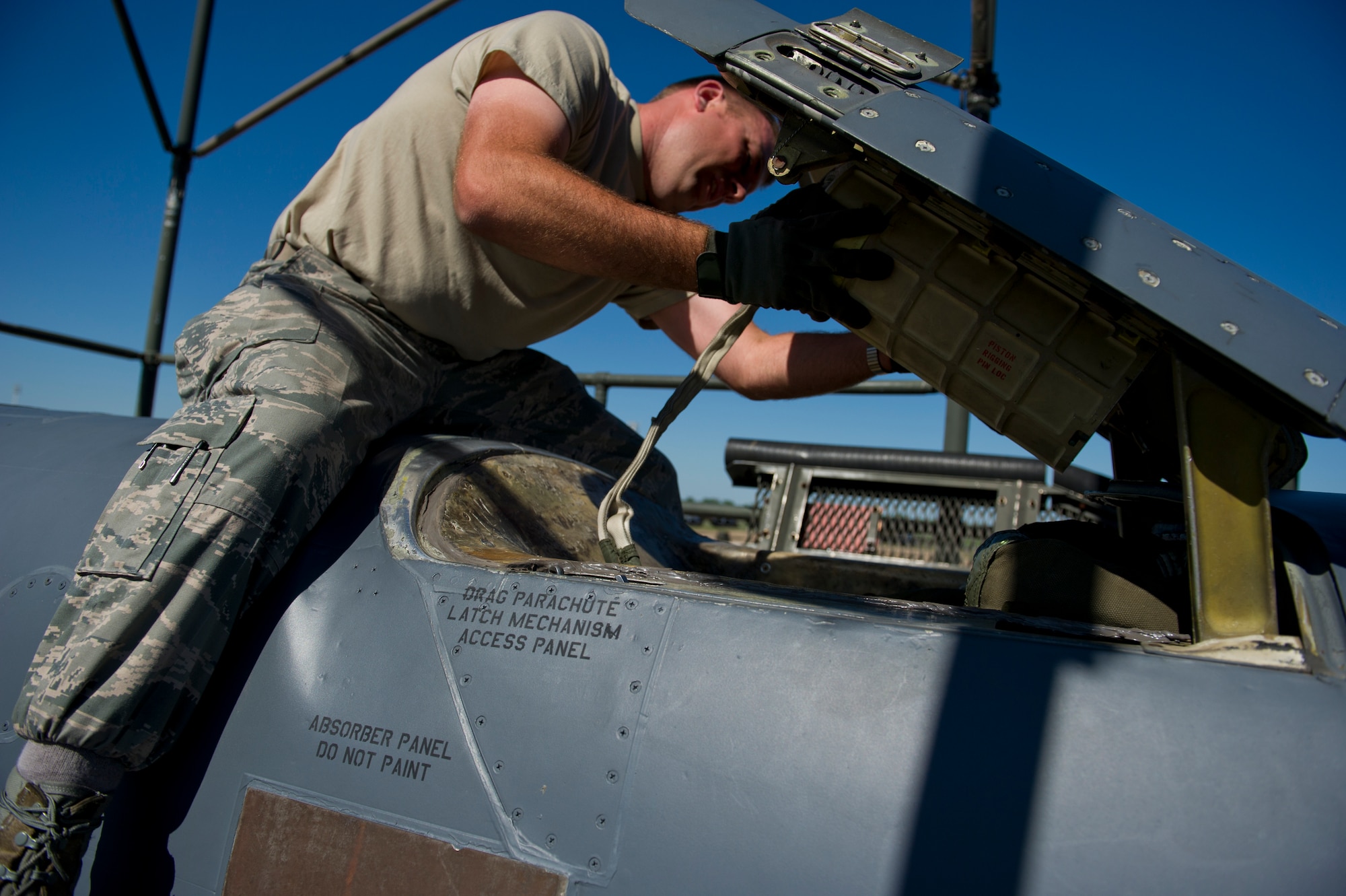 BARKSDALE AIR FORCE BASE, La. - Tech. Sgt. Kevin Rowe, 96th Aircraft Maintenance Unit crew chief, replaces a new drag parachute in a B-52H Stratofortress after a training mission at Barksdale Air Force Base, La., April 18. The drag chute is a parachute that is deployed after landing to help the B-52H slow down. The training allows the air crew to practice numerous capabilities for the B-52H, including nuclear and conventional missions, rapid global strike capabilities and the ability to reach hardened targets anytime, anywhere. (U.S. Air Force photo/Senior Airman Marleah Miller) 