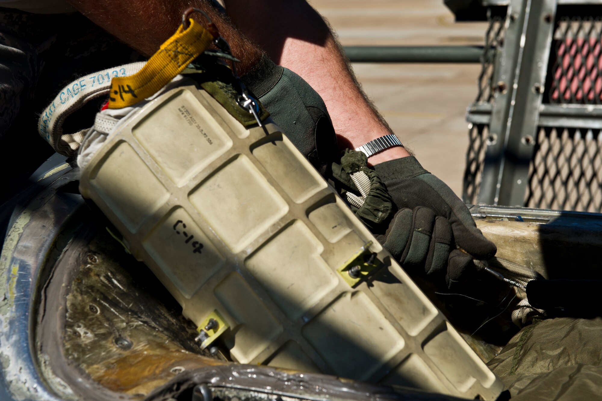 BARKSDALE AIR FORCE BASE, La. - Tech. Sgt. Kevin Rowe, 96th Aircraft Maintenance Unit crew chief, replaces a new drag parachute in a B-52H Stratofortress after a training mission at Barksdale Air Force Base, La., April 18. The drag chute is a parachute that is deployed after landing to help the B-52H slow down. (U.S. Air Force photo/Senior Airman Marleah Miller) 