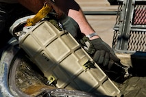 BARKSDALE AIR FORCE BASE, La. - Tech. Sgt. Kevin Rowe, 96th Aircraft Maintenance Unit crew chief, replaces a new drag parachute in a B-52H Stratofortress after a training mission at Barksdale Air Force Base, La., April 18. The drag chute is a parachute that is deployed after landing to help the B-52H slow down. (U.S. Air Force photo/Senior Airman Marleah Miller) 