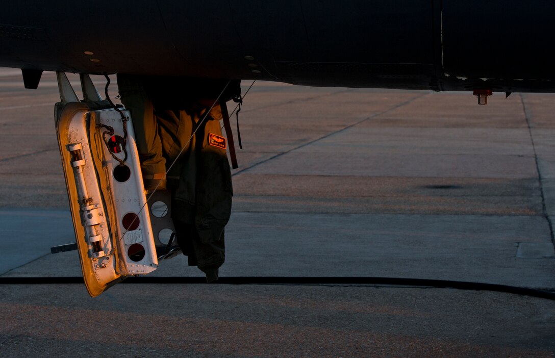 BARKSDALE AIR FORCE BASE, La. - A B-52H Stratofortress crew member from the 96th Bomb Squadron, Barksdale Air Force Base, La., board their aircraft for a training flight, April 18. The training allows the air crew to practice numerous capabilities for the B-52H, including nuclear and conventional missions, rapid global strike capabilities and the ability to reach hardened targets anytime, anywhere. (U.S. Air Force photo/Senior Airman Marleah Miller) 