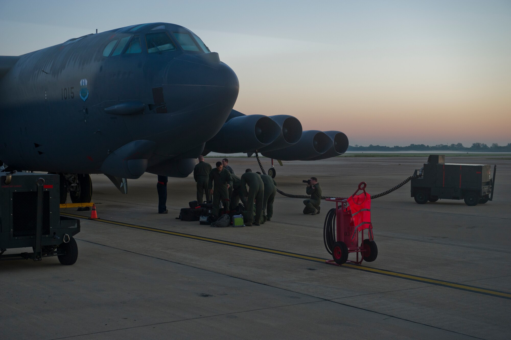 BARKSDALE AIR FORCE BASE, La. - B-52H Stratofortress crew members from the 96th Bomb Squadron, Barksdale Air Force Base, La., begin to board for a training flight, April 18. The training allows the air crew to practice numerous capabilities for the B-52H, including nuclear and conventional missions, rapid global strike capabilities and the ability to reach hardened targets anytime, anywhere. (U.S. Air Force photo/Senior Airman Marleah Miller) 
