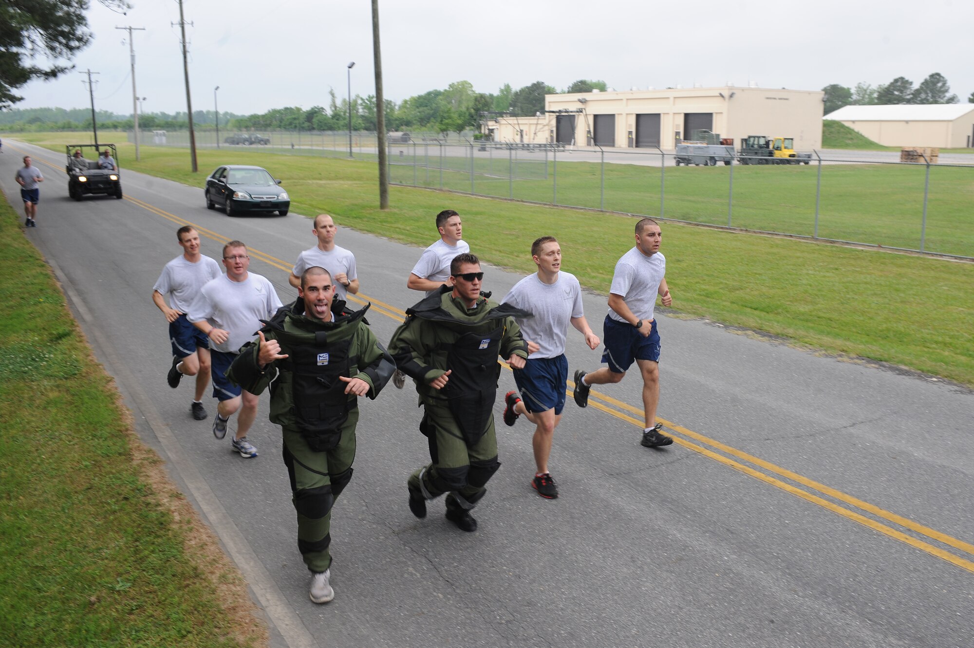Explosive ordnance disposal Airmen compete in a six-mile relay-run on Seymour Johnson Air Force Base, N.C., May 1, 2012. The Airmen ran a mile for each of the six Air Force EOD technicians killed in action in 2011. (U.S. Air Force photo/Airman 1st Class John Nieves Camacho/Released)
