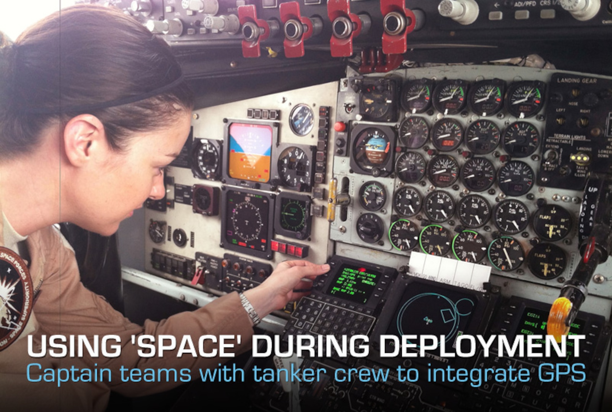 Capt. Tracy Lloyd searches through the embedded GPS/inertial navigation system unit to see the differences in loading/zeroiziing keys on a KC-135 Stratotanker. This was part of her endeavor to enable the airframes to use encrypted GPS. Lloyd is deployed as the theater space integrator for the director of space forces. (U.S. Air Force photo/courtesy photo) 