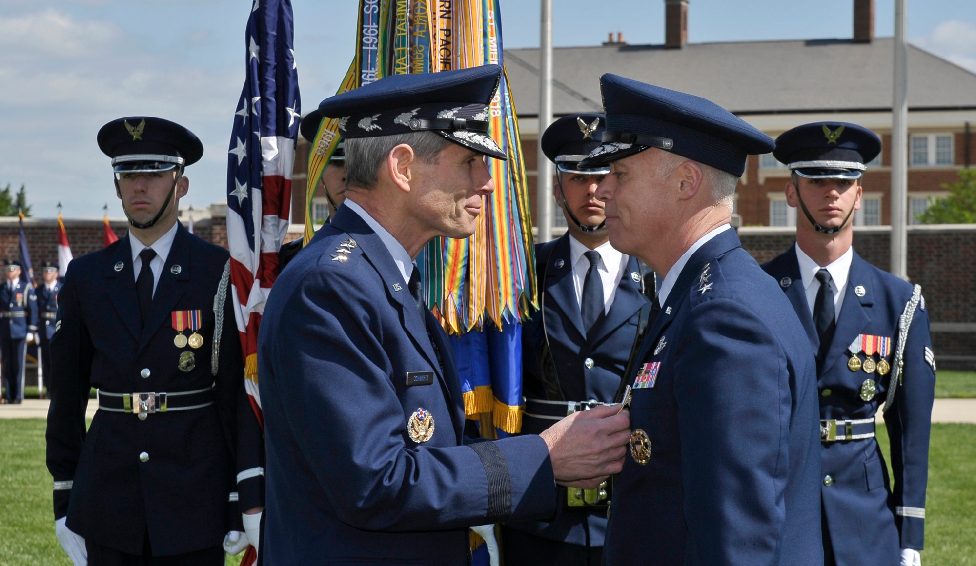 Air Force Chief of Staff Gen. Norton Schwartz awards Lt. Gen. Richard Y. Newton III, Assistant Vice Chief of Staff and Director, Air Staff, Headquarters U.S. Air Force, the Distinguished Service Medal at his retirement ceremony on Joint Base Anacostia-Bolling, D.C., on April 27, 2012.  Newton retires after 34 years of active military service.  (U.S. Air  Force photo/Michael J. Pausic)