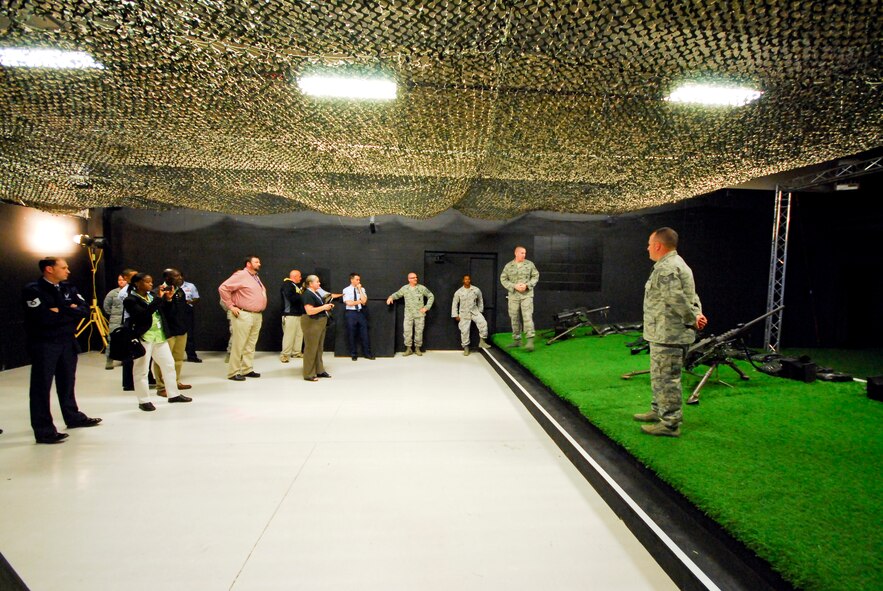 Educators and influencers listen to a briefing about the engage skills trainer at Moody Air Force Base, Ga., April 23, 2012. The orientation provided the influencers interactive experiences that brought the base’s mission to life. (U.S. Air Force photo by Tech. Sgt. Brad Barth/Released)