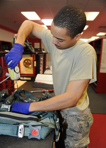 U.S. Air Force Airman 1st Class Joshua Jenkins conducts a pull test on a harness using a push-pull gauge in the 333rd Fighter Squadron’s aircrew flight equipment shop on Seymour Johnson Air Force Base, N.C., May 1, 2012. The push-pull gauge tests the tension strength in the ejector strap to ensure a pull force of seven plus or minus two inch pounds. Jenkins, 4th Operations Support Squadron AFE apprentice, hails from Detroit. (U.S. Air Force photo/Airman 1st Class John Nieves Camacho/Released)