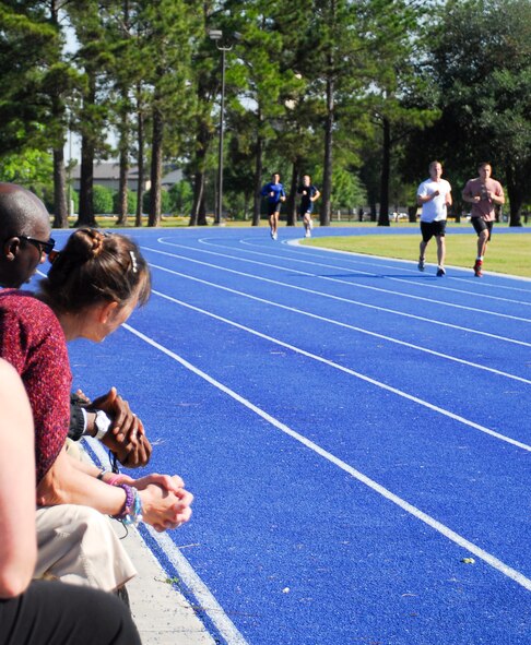 Educators and influencers watch potential special operations Airmen take a physical abilities and stamina test (PAST) at Moody Air Force Base, Ga., April 24, 2012. The PAST is a requirement for anyone trying to join a Special Operations career field. (U.S. Air Force photo by Tech. Sgt. Brad Barth/Released)