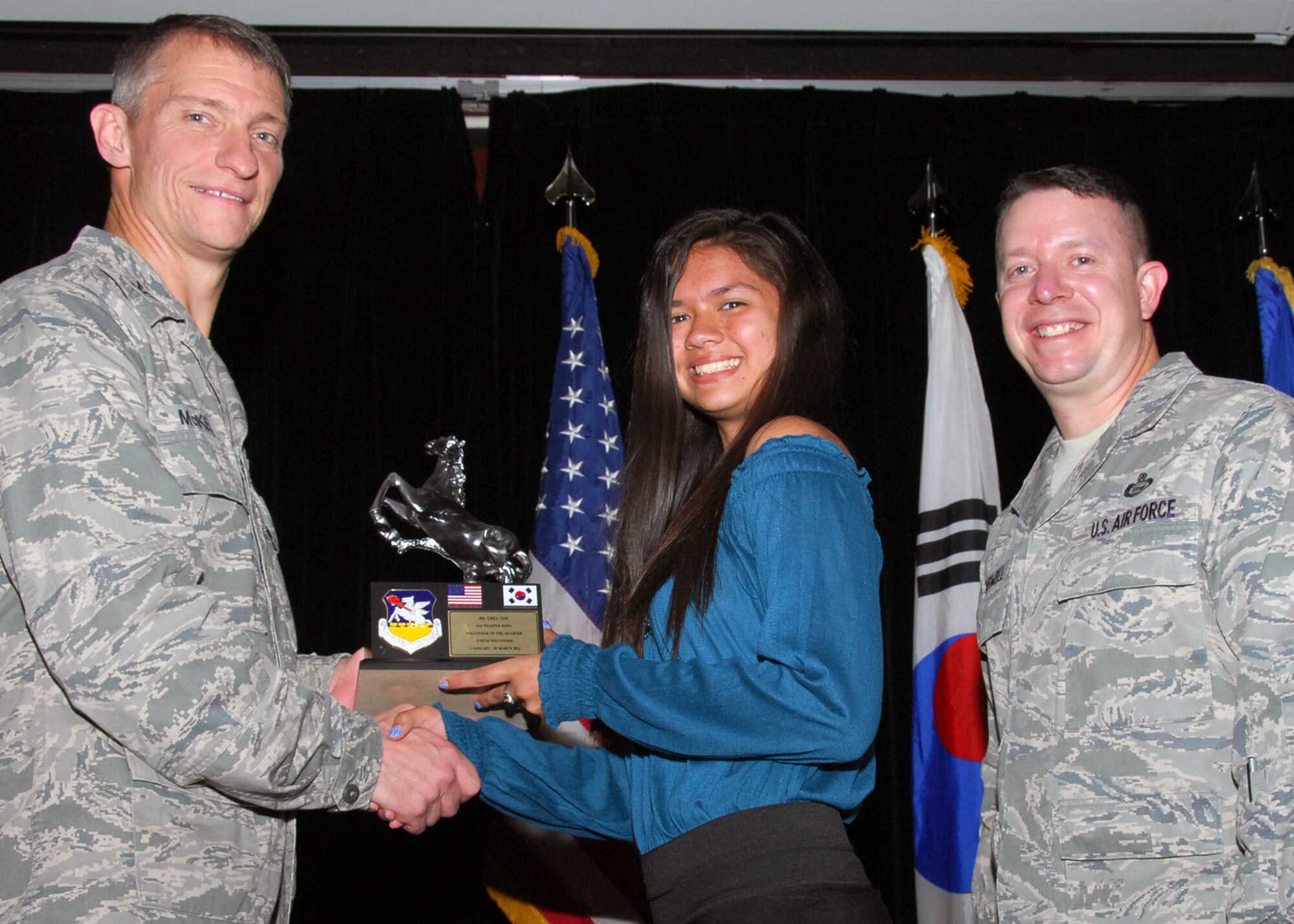 Ms. Ghea Cox, Volunteer of the Quarter, youth category. (U.S. Air Force photo/Mr. Song, Kyong Hwan)