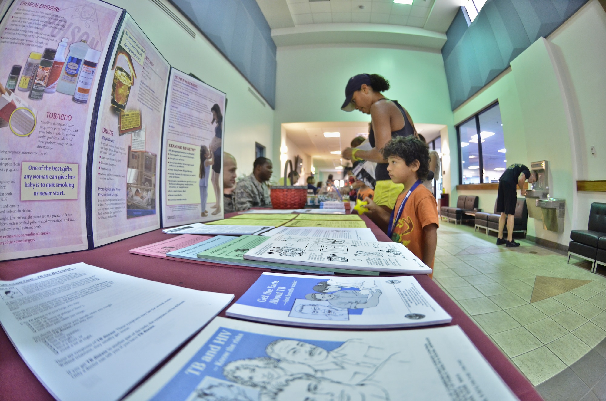 Airman and dependants attend the health and wellness fair held at the Coral Reef Fitness Center May 1. The Health and Wellness Center provided the fair for servicemembers and their dependants at the fitness center. The array of booths set up varied from the family advocacy program, education, healthy eating, immunizations and massage therapy. (U.S. Air Force photo by Staff Sgt. Alexandre Montes)