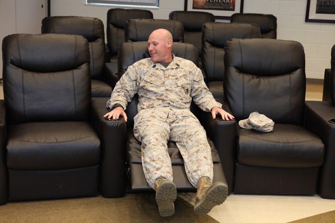 Roger Withrow, a shooting coach for the All-Marine team, cheers for his Marines during the shooting portion of the 2012 Warrior Games at the Olympic Training Center in Colorado Springs May 3. The Marines destroyed the competition winning 20 out of 24 medals for the second year in a row.