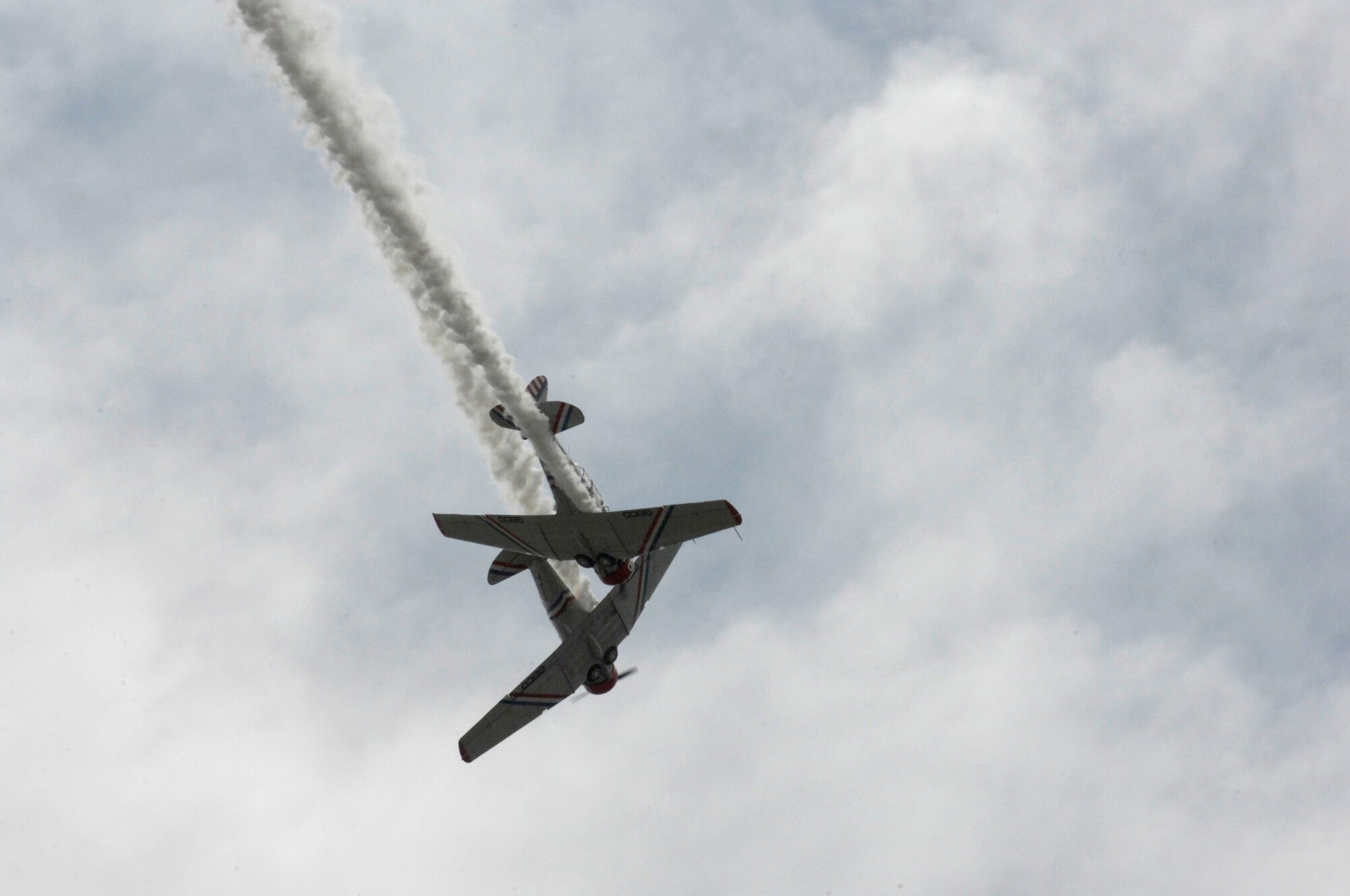 Two BT-13 aircraft demonstrate their air mobility and skills of their pilots during Shaw Air Expo at Shaw Air Force Base, S.C., on May 4. Public admission is May 5 thorugh 6 and visitors will see various static displays and aircraft,  highlighted with performances from the U.S. Air Force Heritage of America Band, the Thunderbirds and the U.S. Army Golden Knights. (U.S. Air Force photo by Airman 1st Class Krystal M. Jeffers/Released)