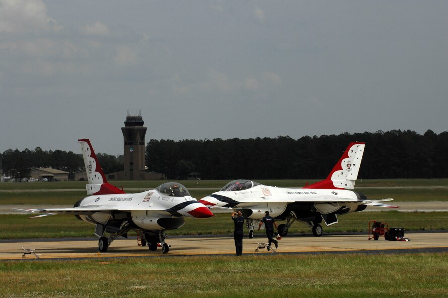 Two U.S. Air Force Thunderbirds land after performing their rountine during Shaw Air Expo, Shaw Air Force Base, S.C., May 4, 2012. The Expo has more than 18 air performances and static displays.(U.S. Air Force photo by Airman 1st Class Krystal M. Jeffers/Released)